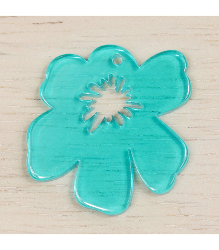 Pendentif Fleur Sakura Evidée en acrylique bleu turquoise transparent